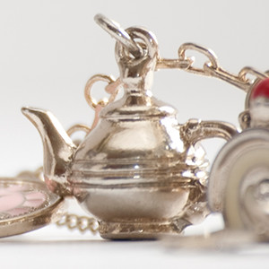 Charms and a teapot